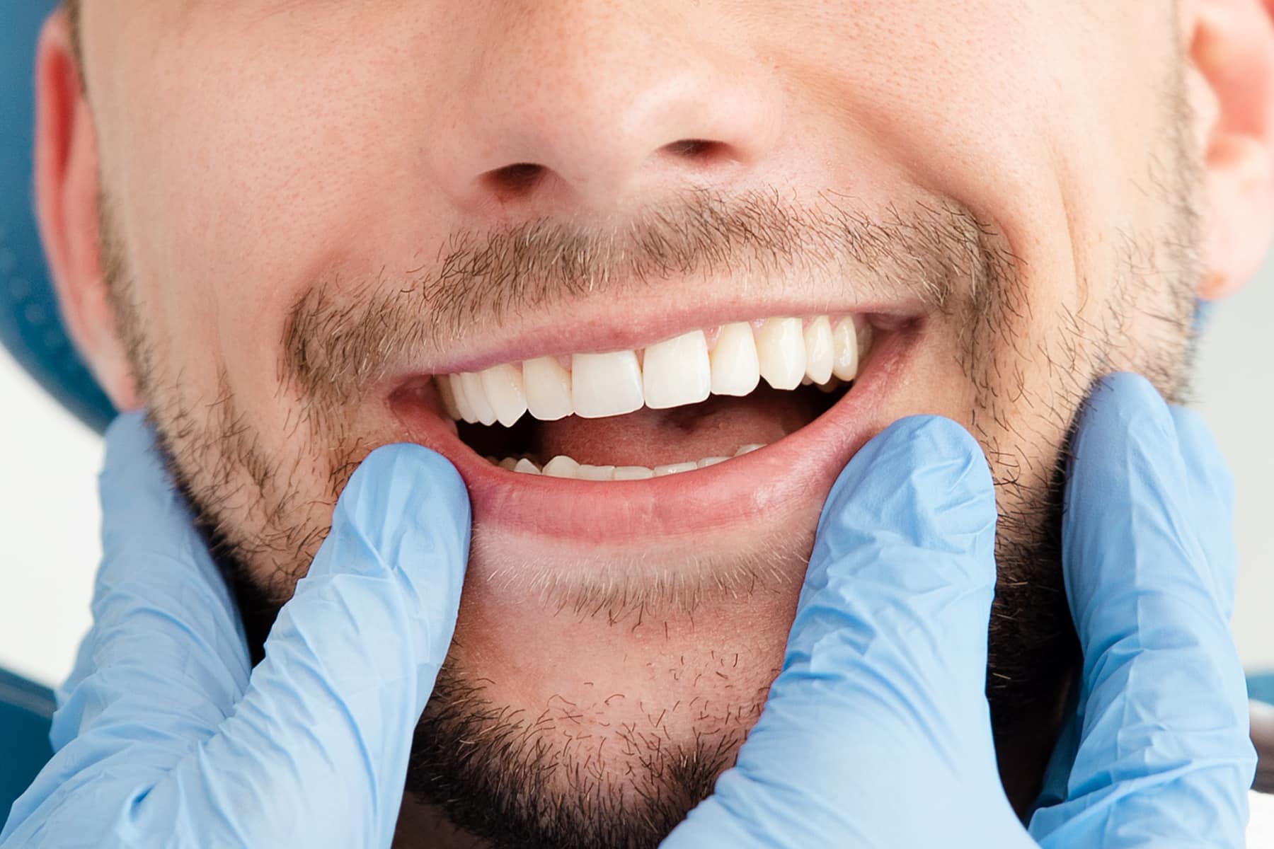 Man getting an oral cancer screening in Westerville, OH